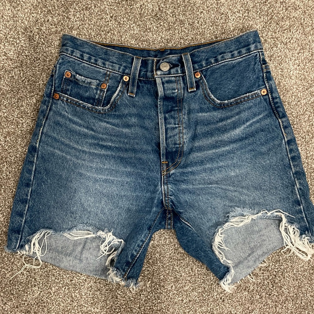 Dark Wash Levi’s Mid-length shorts with rips